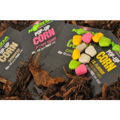 Korda Pop-Up Corn Fruity Squid 12ks - růžová (ovoce-oliheň) umělá kukuřice plovoucí